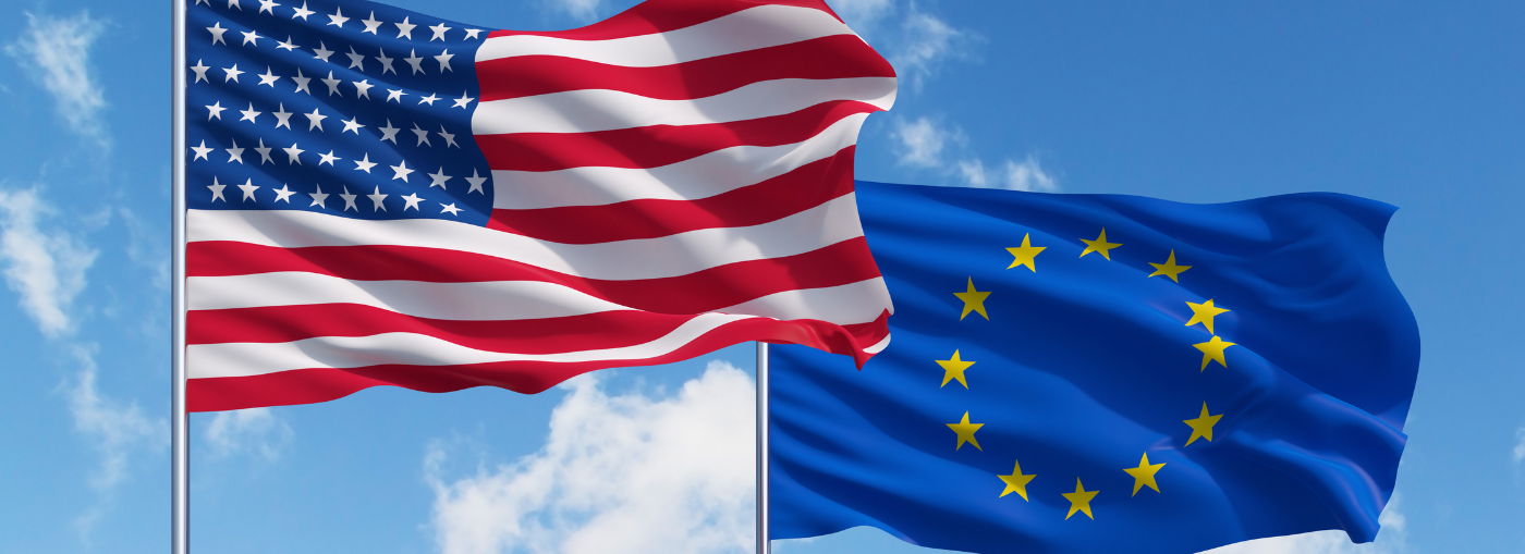 Le bandiere di Stati Uniti e Unione Europea, simbolo delle decisioni di Fed e BCE sui tassi di interesse.