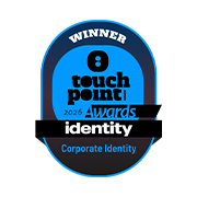 Winner badge for the 2026 Touchpoint Awards in Corporate Identity. Blue and black design with bold text, conveying achievement and professionalism.